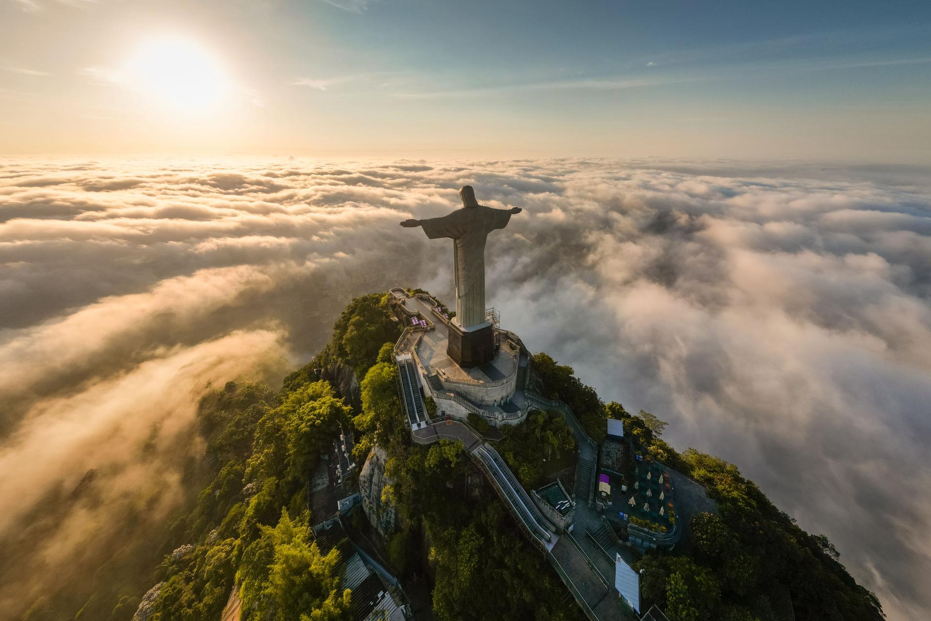 Christ the Redeemer Statue on Corcovado Mountain Above Clouds